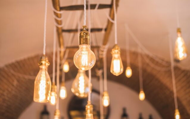 Light bulbs on the ceiling in the bar and restaurant. Italian cafe with lighting